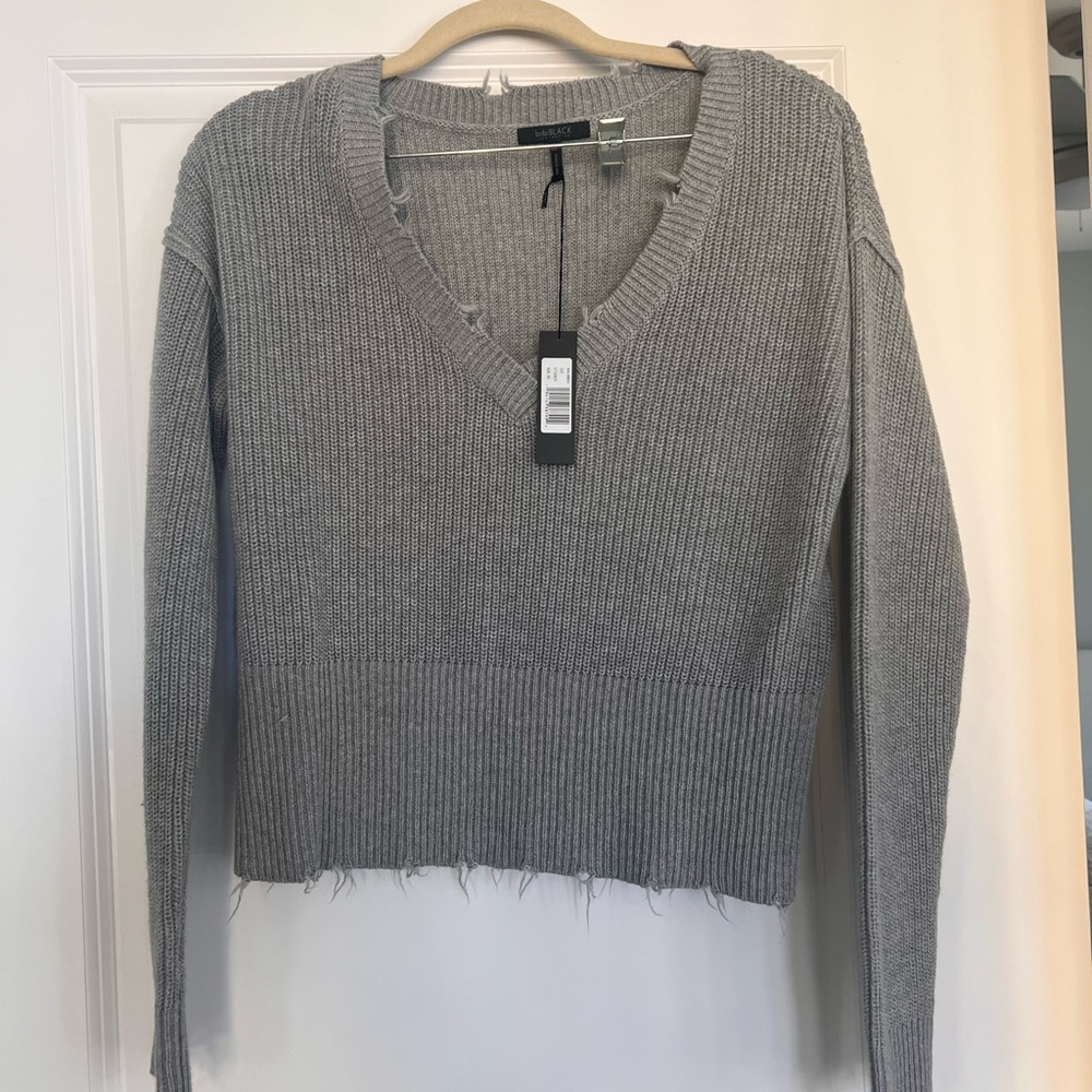 Grey sweater with tags